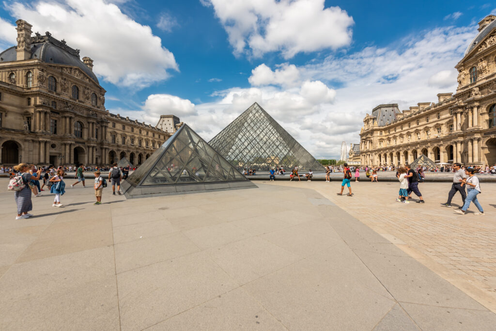 Exterior courtyard of the Louvre in Paris, France on a sunny day