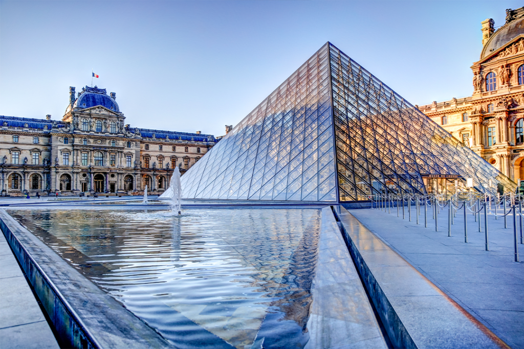 Paris, France - July 3, 2019 - IM Pei designed pyramid at the Louvre
